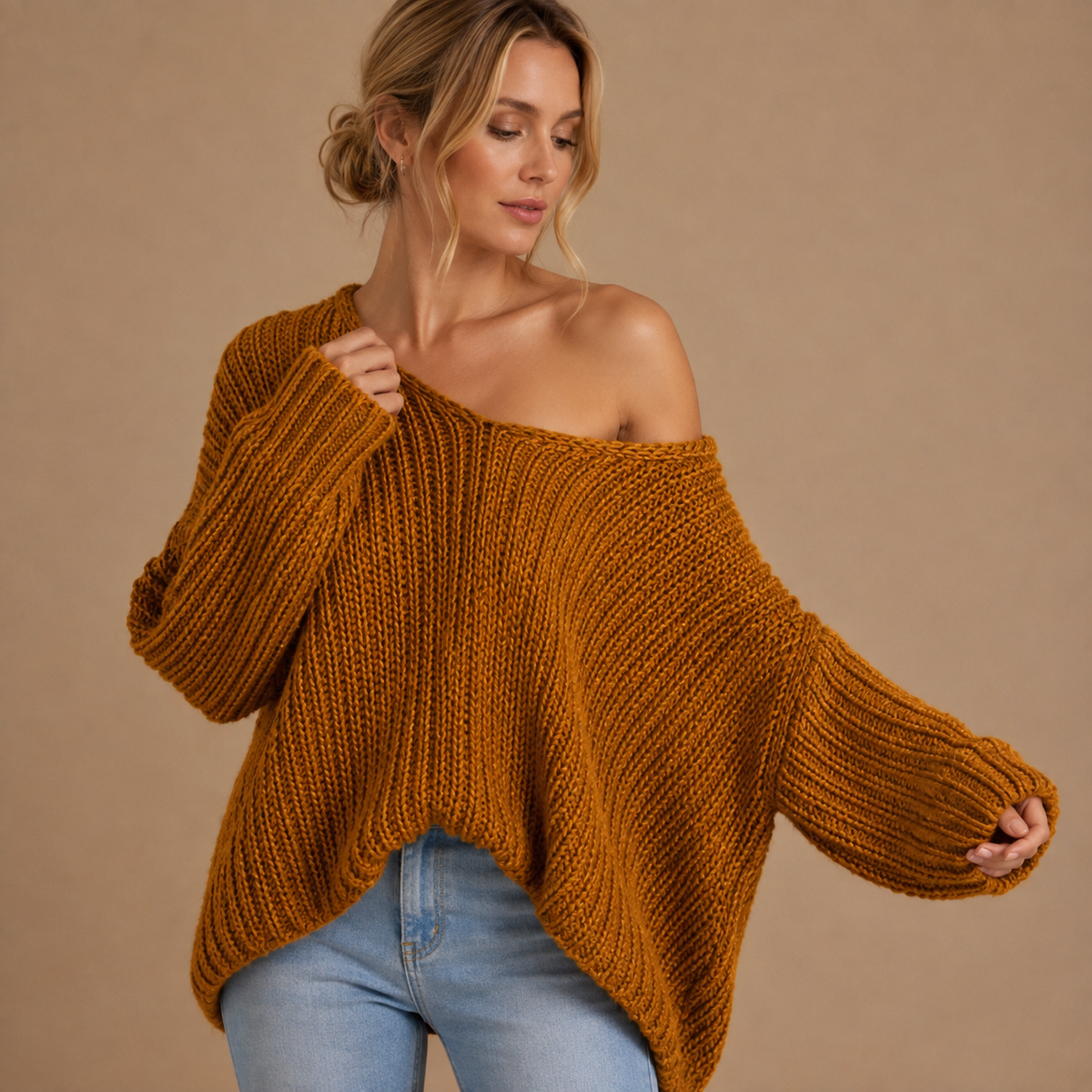 Damski sweter oversize z dekoltem łódka i luźnymi rękawami