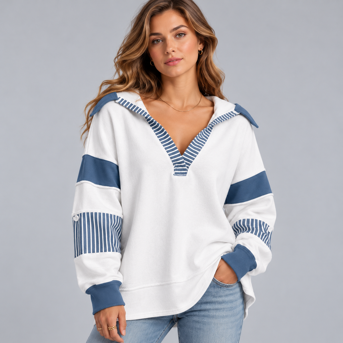 Damska bluza oversize z dekoltem V i detalami w paski