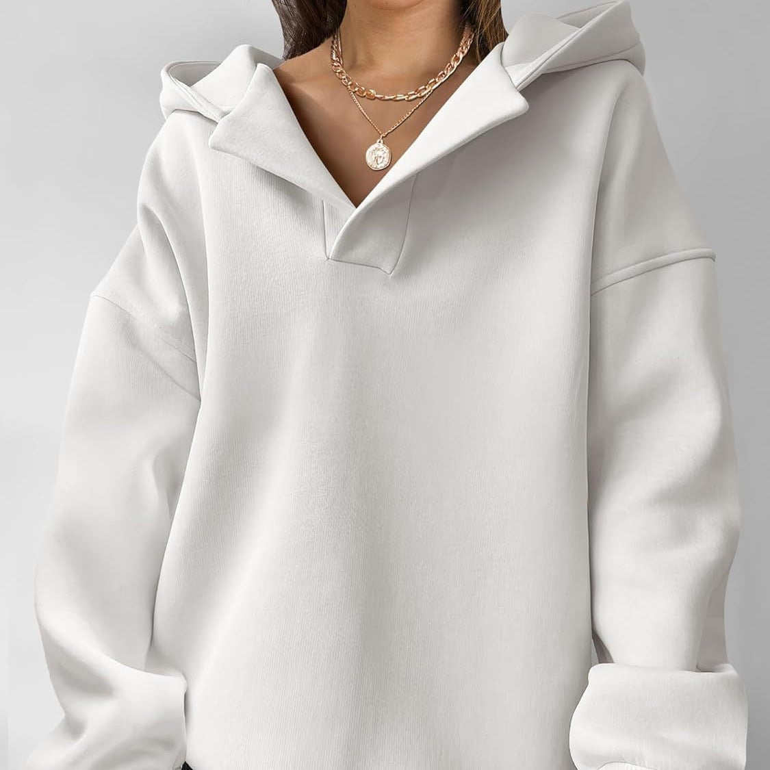 Bluza polarowa damska oversize z kapturem i dekoltem w serek