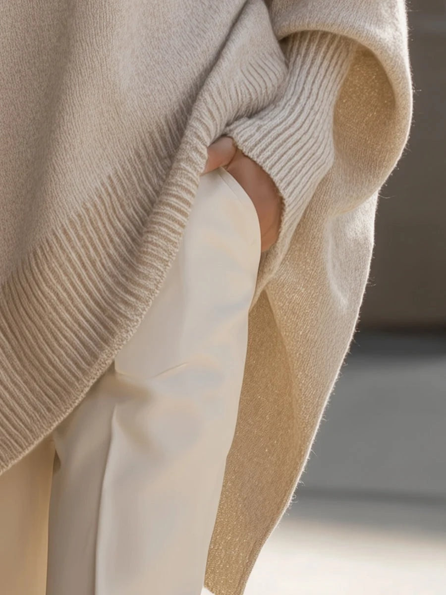 Damski sweter kaszmirowy oversize z asymetrycznym dołem