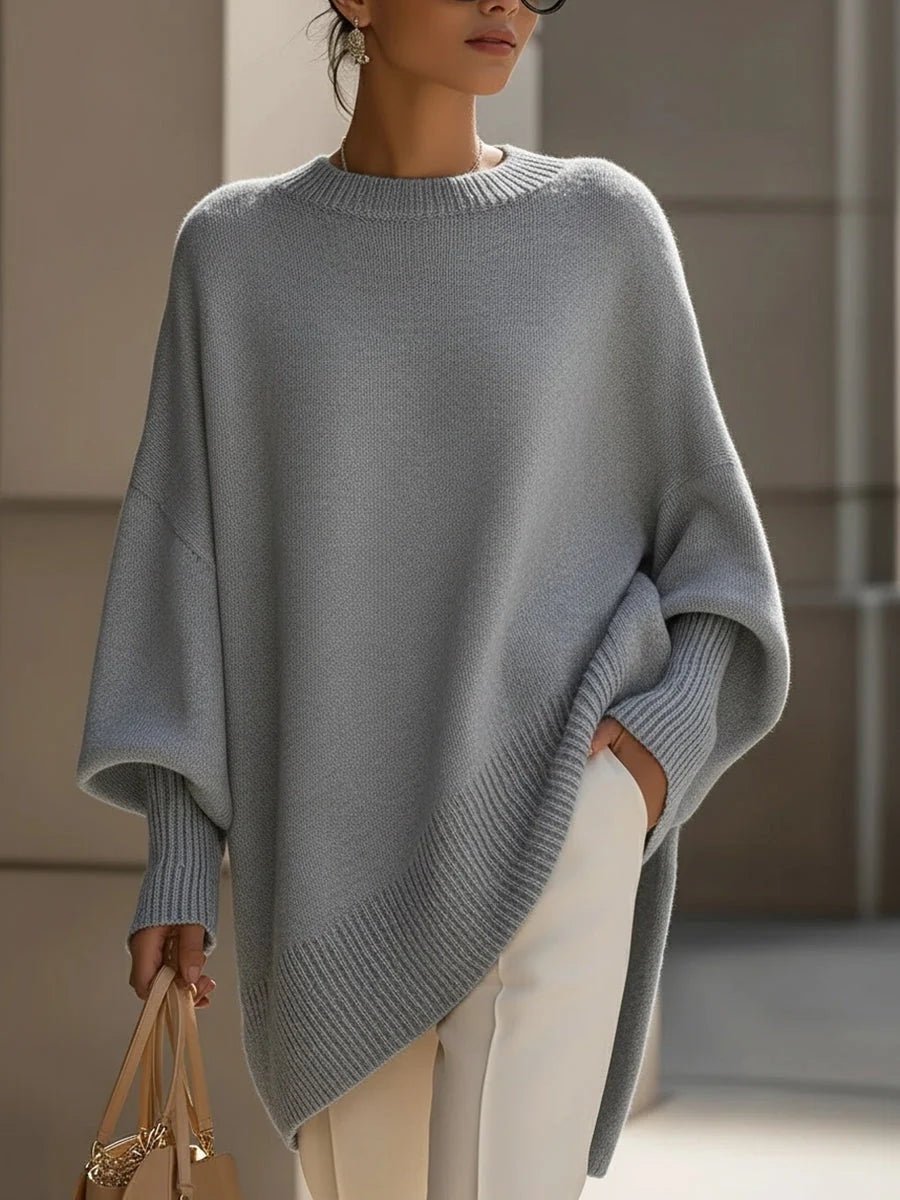 Damski sweter kaszmirowy oversize z asymetrycznym dołem