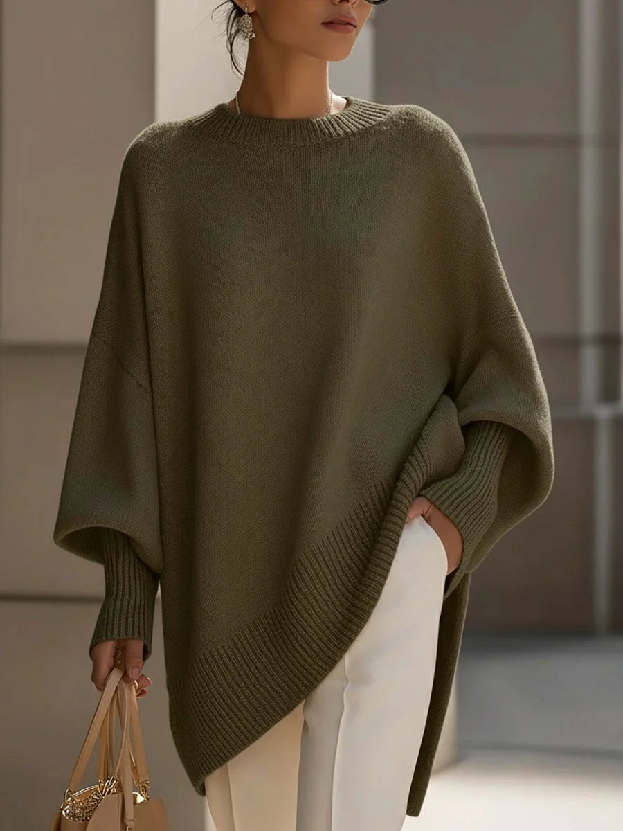 Damski sweter kaszmirowy oversize z asymetrycznym dołem