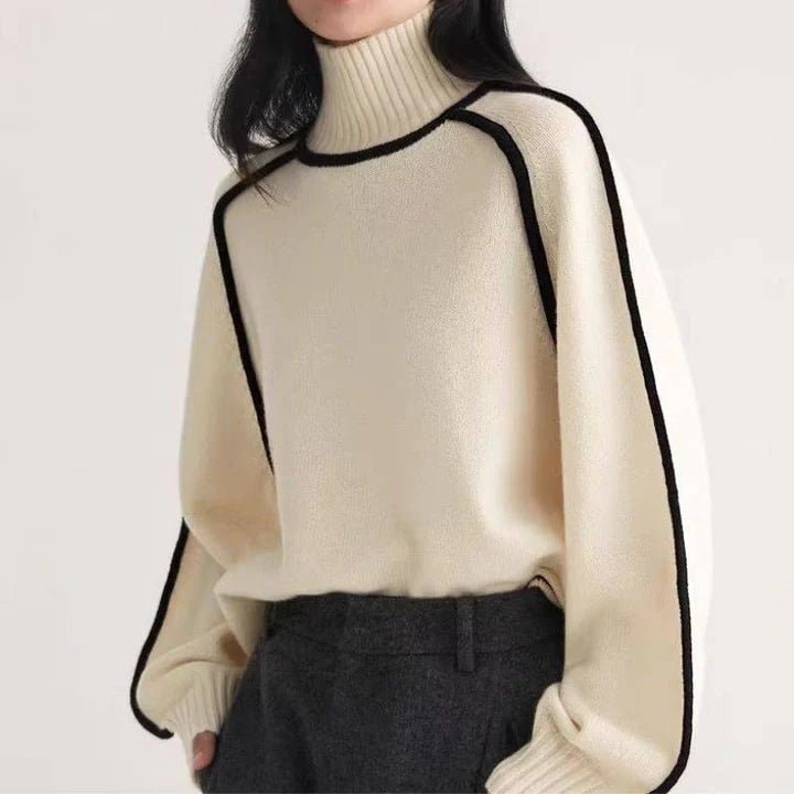 Sweter damski oversize wełniany z golfem i czarną lamówką