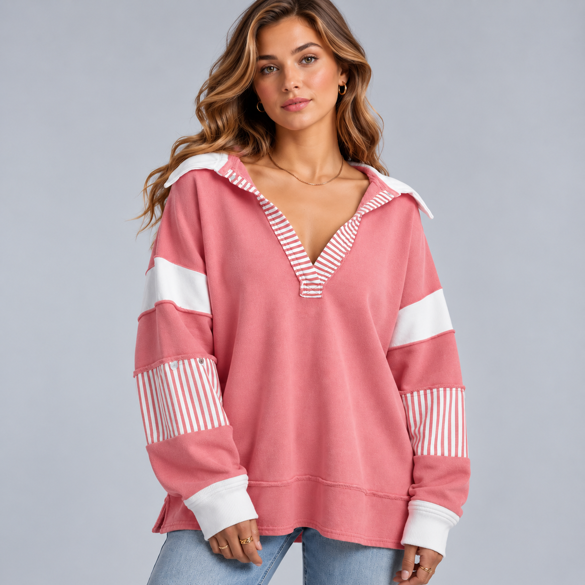 Damska bluza oversize z dekoltem V i detalami w paski