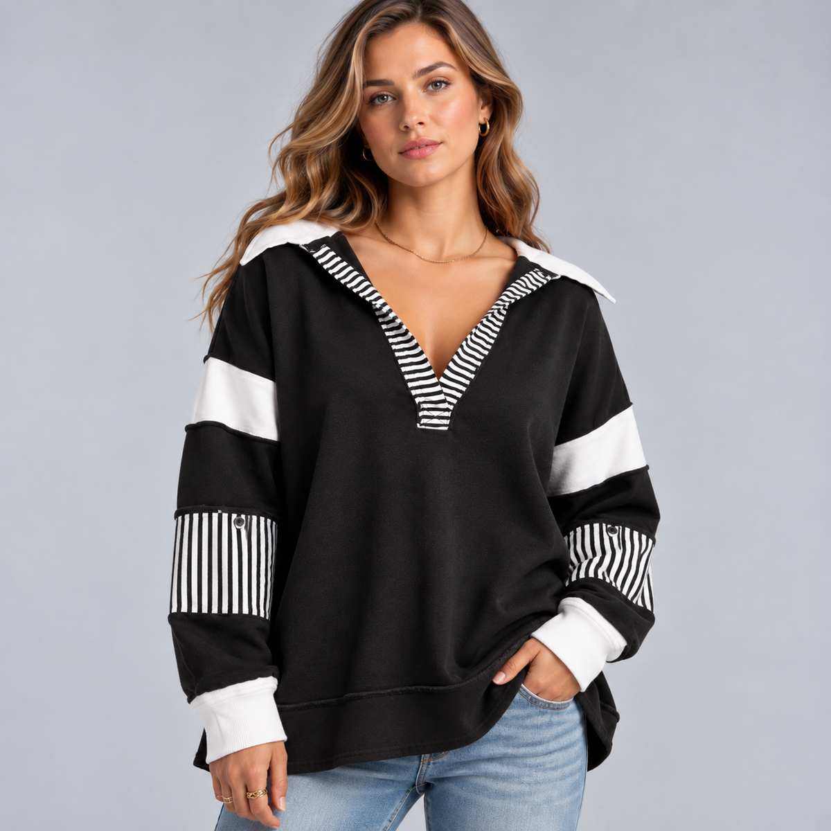 Damska bluza oversize z dekoltem V i detalami w paski