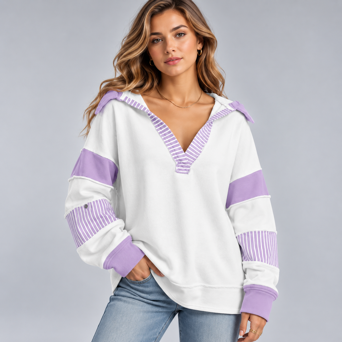 Damska bluza oversize z dekoltem V i detalami w paski