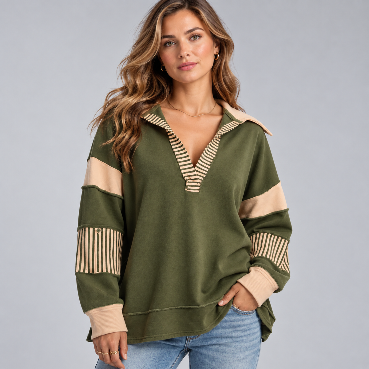 Damska bluza oversize z dekoltem V i detalami w paski