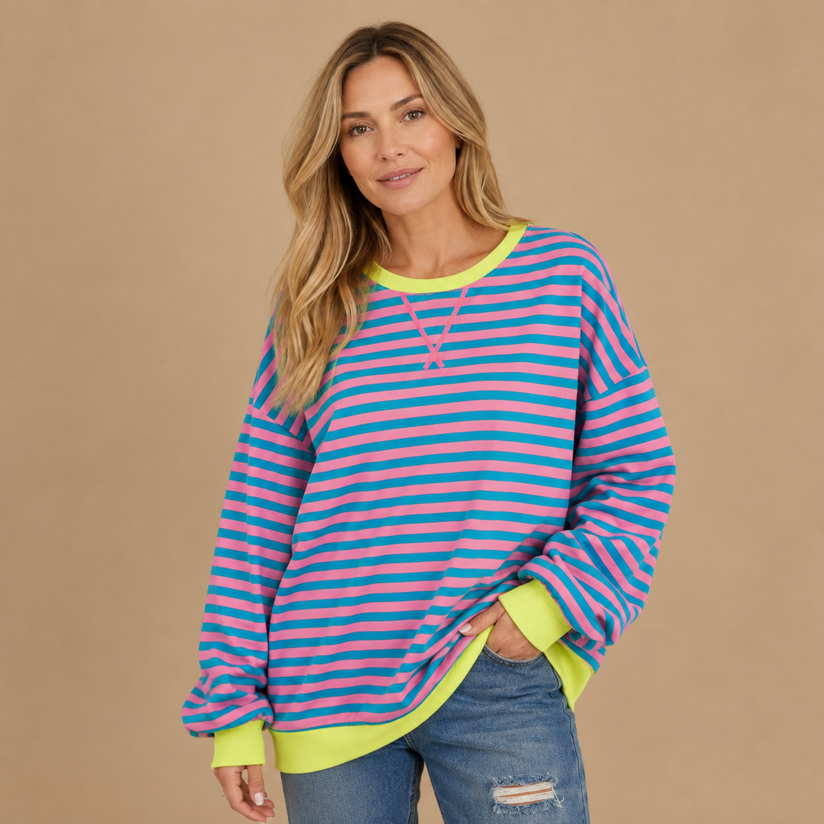 Damska bluza oversize w paski z kontrastowymi ściągaczami